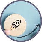 Finger moving a rocket token up along some steps